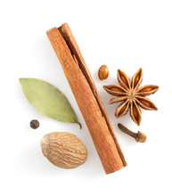 Cinnamon Sticks, Anise Star And Spices On White