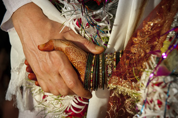 Western couple getting married in an Indian ceremony