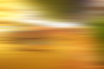 Wall Mural - abstract warm yellow background motion blur