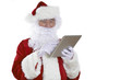 © highwaystarz - Santa Claus Using Digital Tablet On White Background