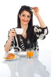 © fotocerva - Girl having breakfast in office