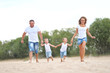 © zagorodnaya - portrait of a happy family in summer nature