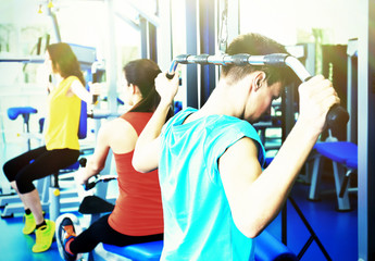 Sticker - Group of people training with weights in gym