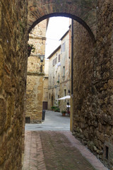 Wall Mural - Arch on a street in an old town from Tuscany