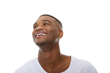 Wall Mural - Close up portrait of a happy young african american man laughing