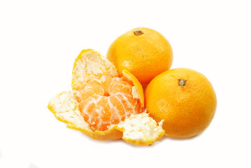 Wall Mural - Eating Healthy Organic Tangerines Over White