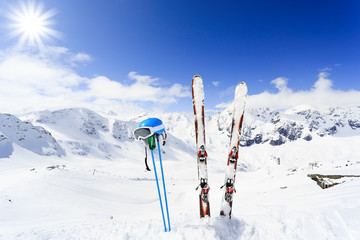 Fototapete - Ski , mountains and ski equipments on ski run