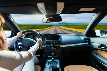 Woman driving her car