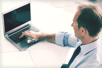 Wall Mural - miling businessman working in office