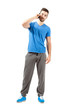 © sharplaninac - Sporty fit man on the mobile phone