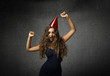 © Garrincha - girl dancing with pointed party hat on head