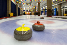 Curling Stones On An Indoor Rink