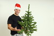 © petrdlouhy - Santa claus offers you a spruce tree