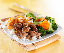 Beef And Shrimp Teriyaki Combination On White Rice