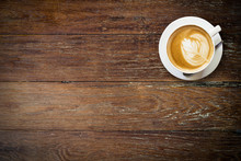 Latte Coffee On Wood With Space.