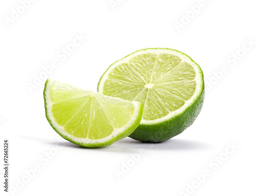Fotografie, Obraz Limes with slices isolated on white background