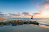 Fototapeta  - Island beach sunrise and yoga practice