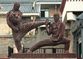 statue of two fighters near Shaolin temple