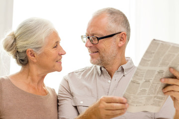 Sticker - happy senior couple reading newspaper at home