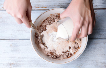 Wall Mural - preparing dough, mixing ingredients