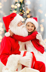 Sticker - smiling little girl with santa claus