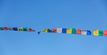 Tibetan Prayer Flags Blowing In The Wind