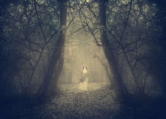 White ghost appears in the forest's mist