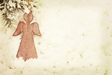Vintage Christmas Angel On Snow Background