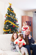 © JackF - Family with Christmas tree