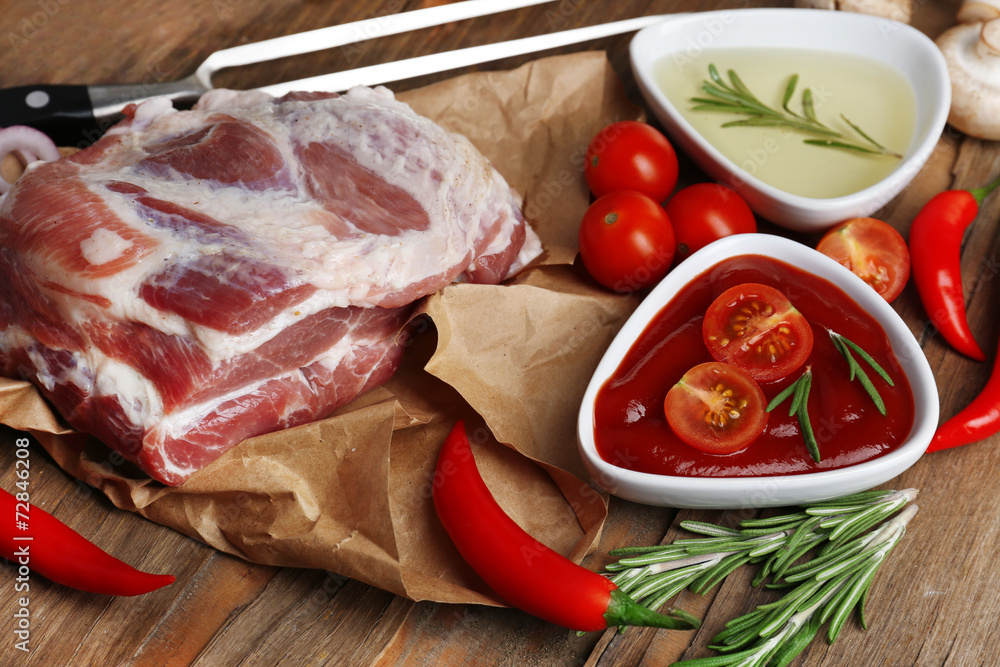 Raw meat on wooden table, close-up