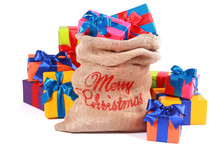 Christmas Sack With Colorful Gift-wrapped Presents