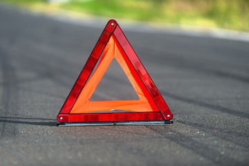 Red triangle of a car