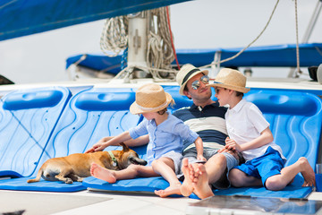 Wall Mural - Family sailing on a luxury yacht