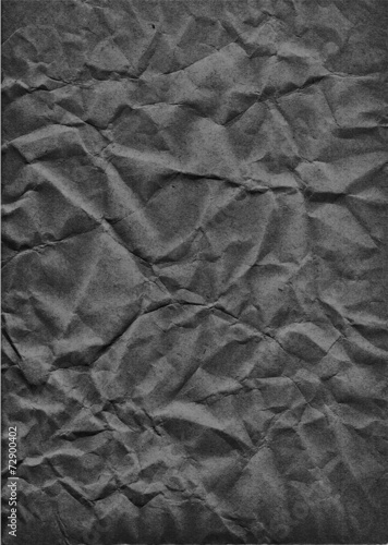 Fototapeta na wymiar Dark crumpled paper texture