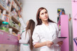© DC Studio - Two pharmacist woman one with digital tablet