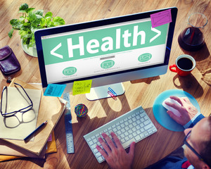 Wall Mural - Man Working on Computer With Word Health