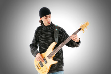 Guitar player isolated on the white background