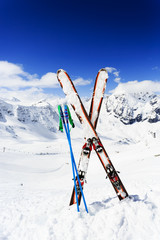 Fototapete - Skiing , mountains and ski equipments on ski run
