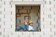 © Aliaksei Lasevich - boy and girl playing on construction site