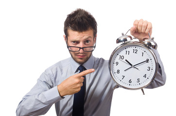 Wall Mural - Man with clock trying to meet the deadline isolated on white