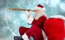 Composite Image Of Santa Claus Looking Through Telescope