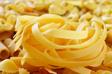 Wall Mural - different types of uncooked pasta