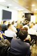 © Dmitry Vereshchagin - The audience listens to the acting in a conference hall