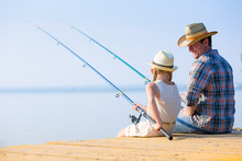 Father And Daughter Fishing