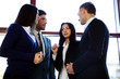 © Drobot Dean - Group of business people talking in the office