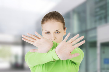 Woman making stop sign