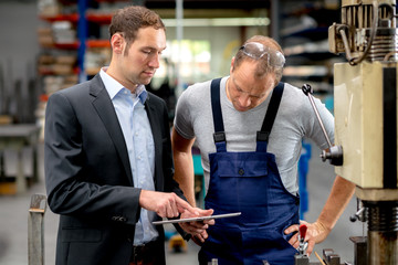 young boss and worker in conversation