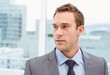 © WavebreakMediaMicro - Smart young businessman in suit