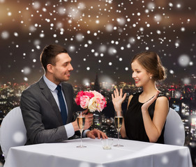 Poster - smiling couple at restaurant