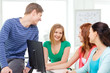 © Syda Productions - group of smiling students having discussion